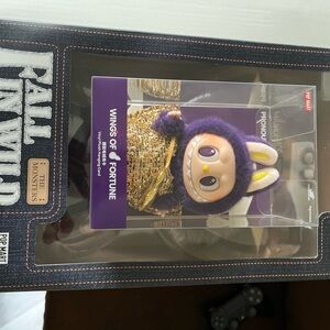 Purple and Gold Wings of Fortune Figure